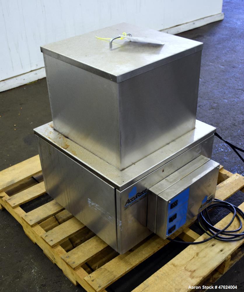Used Accu-Rate 600 Series Dry Material Feeder, Model 612, 304 Stainless Steel. Approximately 1-7/8" diameter helix, vinyl mass flow hopper with dual paddle agitation, 304 stainless steel hopper exten...