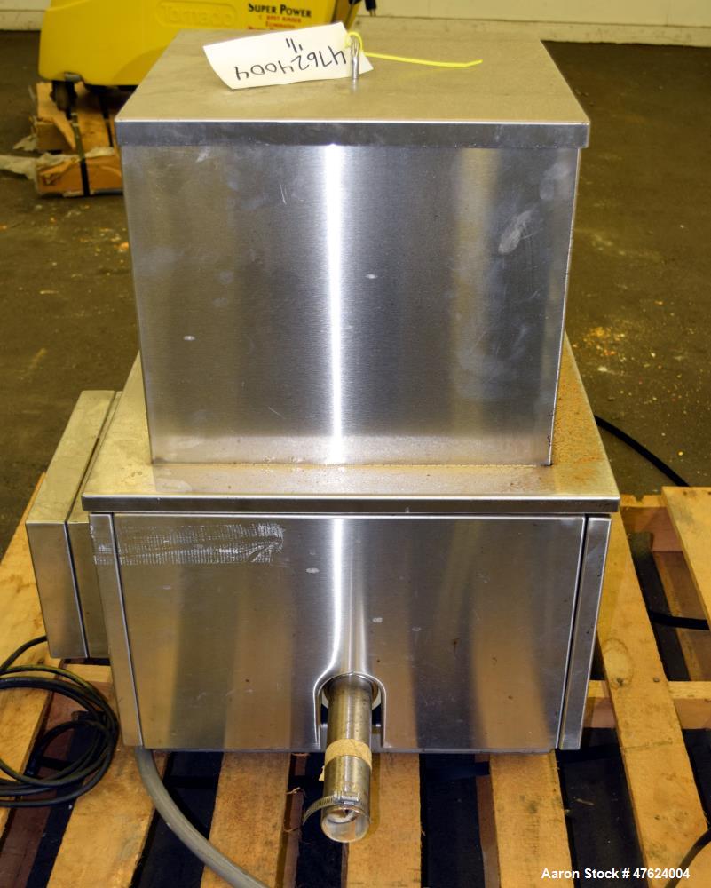 Used Accu-Rate 600 Series Dry Material Feeder, Model 612, 304 Stainless Steel. Approximately 1-7/8" diameter helix, vinyl mass flow hopper with dual paddle agitation, 304 stainless steel hopper exten...