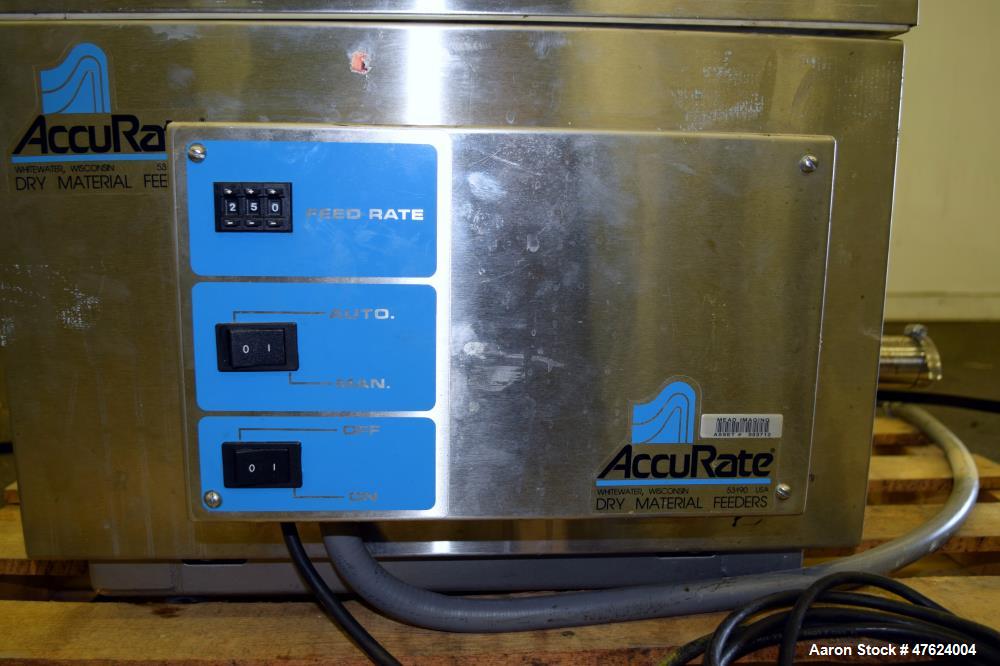 Used Accu-Rate 600 Series Dry Material Feeder, Model 612, 304 Stainless Steel. Approximately 1-7/8" diameter helix, vinyl mass flow hopper with dual paddle agitation, 304 stainless steel hopper exten...