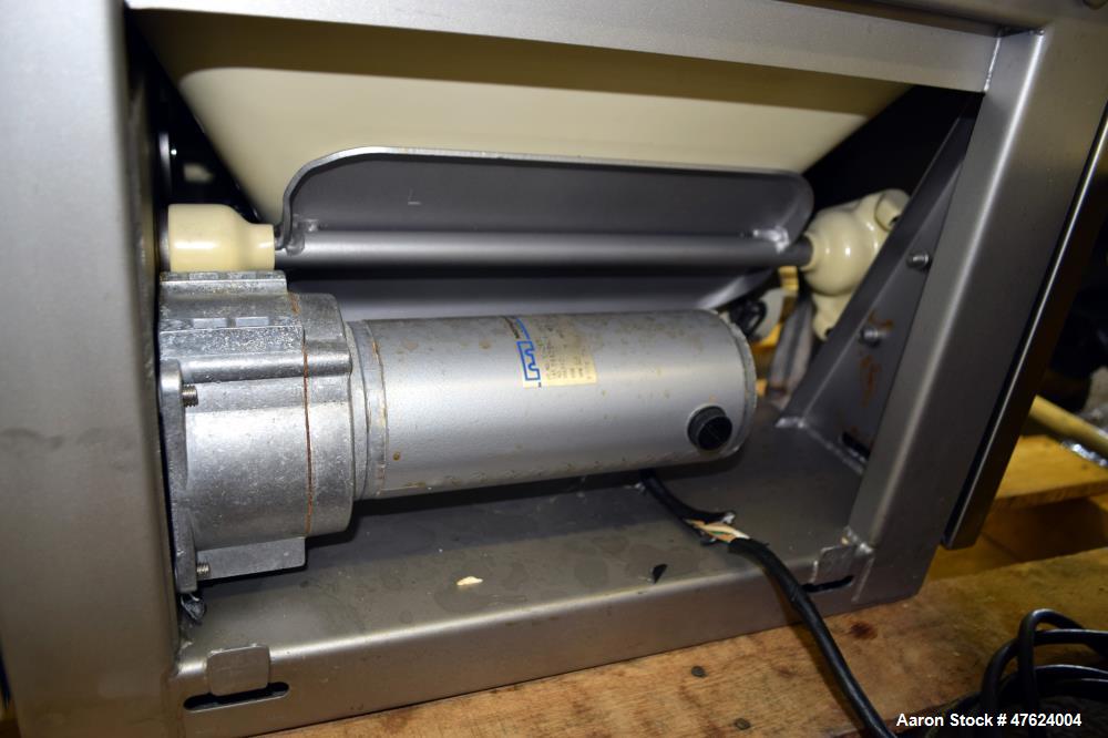 Used Accu-Rate 600 Series Dry Material Feeder, Model 612, 304 Stainless Steel. Approximately 1-7/8" diameter helix, vinyl mass flow hopper with dual paddle agitation, 304 stainless steel hopper exten...