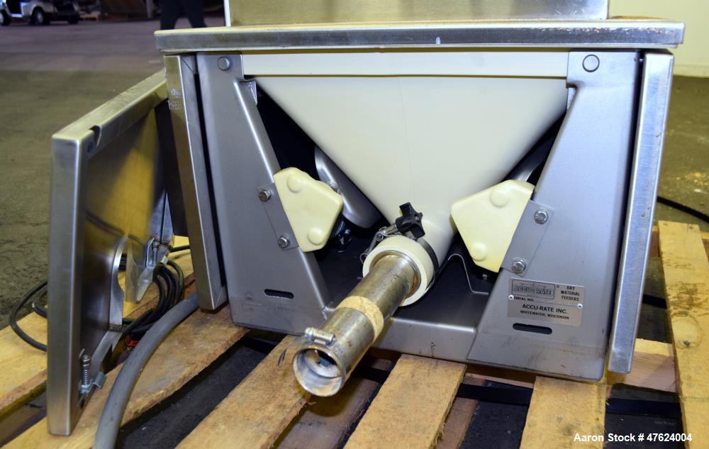 Used Accu-Rate 600 Series Dry Material Feeder, Model 612, 304 Stainless Steel. Approximately 1-7/8" diameter helix, vinyl mass flow hopper with dual paddle agitation, 304 stainless steel hopper exten...