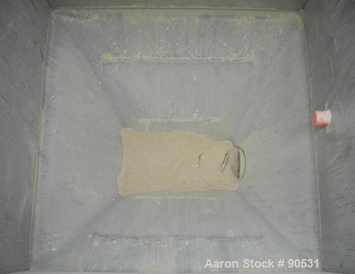 USED: Accurate Volumetric Dry Material Feeder. Approximate 3" diameter x 45" long stainless steel screw. Approximate feed rate to 300 cubic feet an hour. Vinyl hopper, capacity 2.65 cubic feet. Drive...