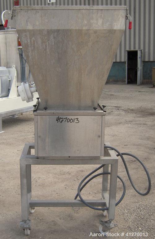 Used AccuRate Dry Material Feeder, Type MOD610M, 304 Stainless Steel. Approximately 1.75" diameter x 28" long helix, feed rate approximately 36 cubic feet per hour. Vinyl feed hopper, capacity .9 cub...