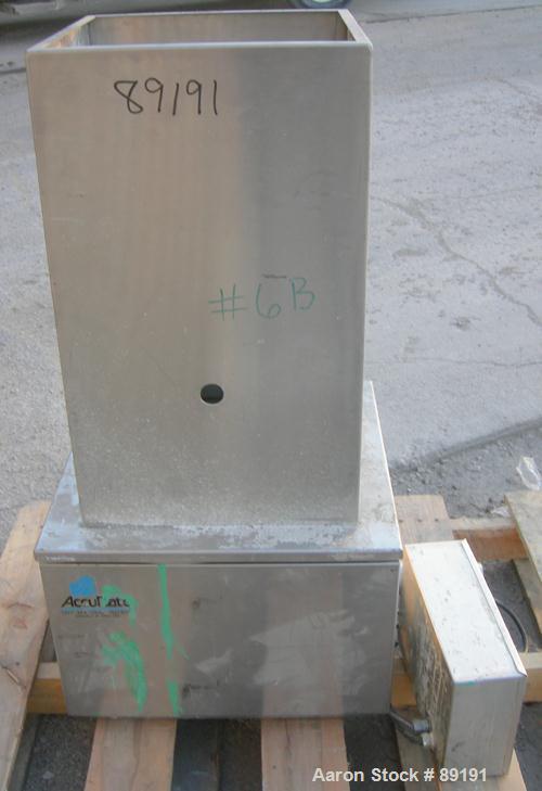 USED: Accurate volumetric dry material feeder. Approximate 2-1/4" diameter x 30" long 304 stainless steel screw, feed rate to 48 cubic feet an hour. Vinyl hopper, capacity .9 cubic feet. Driven by a ...