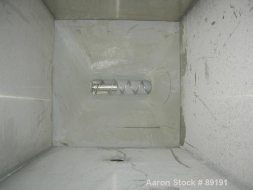 USED: Accurate volumetric dry material feeder. Approximate 2-1/4" diameter x 30" long 304 stainless steel screw, feed rate to 48 cubic feet an hour. Vinyl hopper, capacity .9 cubic feet. Driven by a ...