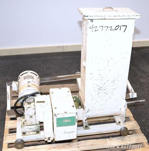 Used Acrison Volumetric Dry Ingredient Feeder, Model 105-A, 304 Stainless Steel. Feed rate to (0.27) cubic feet per hour. Approximate 3/8" diameter x 21" long metering auger with intromitter. Driven ...