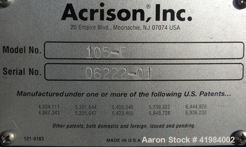Used Acrison Volumetric Dry Ingredient Feeder, model 105-E, 304 stainless steel. Feed rate to 6 cubic feet per hour. 1-3/8" diameter x 24" long metering auger, (1) intromitter, driven by a 1/2 hp, 90...