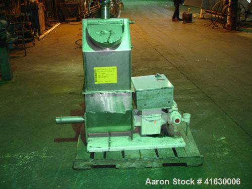 Used Acrison Volumetric Feeder, model 105Z-G, stainless steel. 2-1/2" diameter x 12" long tube, driven by a 1 hp DC motor with controller. Hopper extension. Approximately 29 cubic feet an hour capaci...
