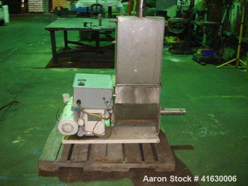 Used Acrison Volumetric Feeder, model 105Z-G, stainless steel. 2-1/2" diameter x 12" long tube, driven by a 1 hp DC motor with controller. Hopper extension. Approximately 29 cubic feet an hour capaci...