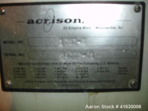 Used Acrison Volumetric Feeder, model 105Z-G, stainless steel. 2-1/2" diameter x 12" long tube, driven by a 1 hp DC motor with controller. Hopper extension. Approximately 29 cubic feet an hour capaci...