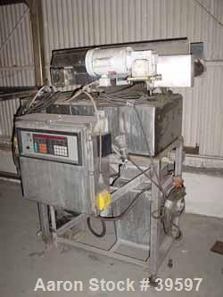 Used Acrison Wildflow Model 203 Feeder. Capacity approximately 2 lb batches. Stainless steel construction. Hard plastic conveyor, 36" long x 18 3/4" with weigh area. Vibrator, Acrison weigh feeder co...