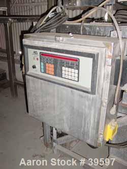 Used- Acrison Wildflow Model 203 Feeder. Capacity approximately 2 lb batches. Stainless steel construction. Hard plastic con...