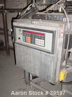 Used Acrison Wildflow Model 203 Feeder. Capacity approximately 2 lb batches. Stainless steel construction. Hard plastic conveyor, 36" long x 18 3/4" with weigh area. Vibrator, Acrison weigh feeder co...