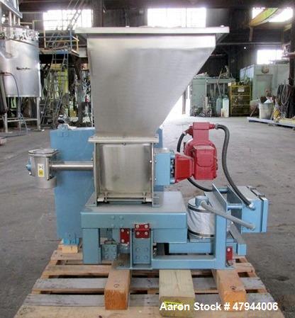 Used Acrison Loss In Weight Feeder, Model 407-200-100-101-0-00. Stainless steel construction, approximately 2" diameter x 9' long screw, 0.5hp DC motor with control panel. Serial #04589-02.
