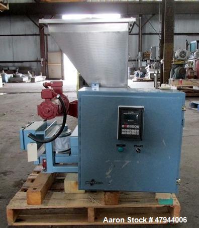 Used Acrison Loss In Weight Feeder, Model 407-200-100-101-0-00. Stainless steel construction, approximately 2" diameter x 9' long screw, 0.5hp DC motor with control panel. Serial #04589-02.