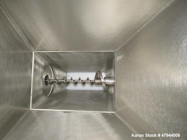 Used Acrison Loss In Weight Feeder, Model 407-200-100-101-0-00. Stainless steel construction, approximately 2" diameter x 9' long screw, 0.5hp DC motor with control panel. Serial #04589-02.