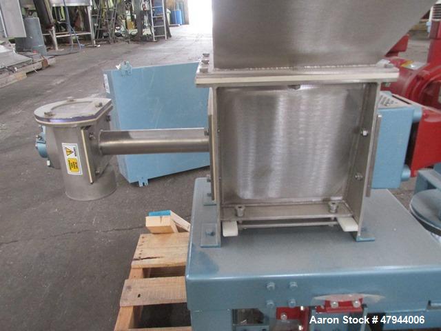 Used Acrison Loss In Weight Feeder, Model 407-200-100-101-0-00. Stainless steel construction, approximately 2" diameter x 9' long screw, 0.5hp DC motor with control panel. Serial #04589-02.