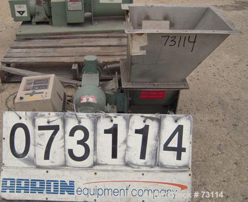 Used Acrison Volumetric Feeder, Model 105X-G, 304 Stainless Steel. Trough measures approximately 9" diameter x 10" long x 7" deep with a 20’’ extension. Driven by a 1/4 hp, 90 volt, 1725 rpm gear mot...