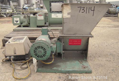Used Acrison Volumetric Feeder, Model 105X-G, 304 Stainless Steel. Trough measures approximately 9" diameter x 10" long x 7" deep with a 20’’ extension. Driven by a 1/4 hp, 90 volt, 1725 rpm gear mot...
