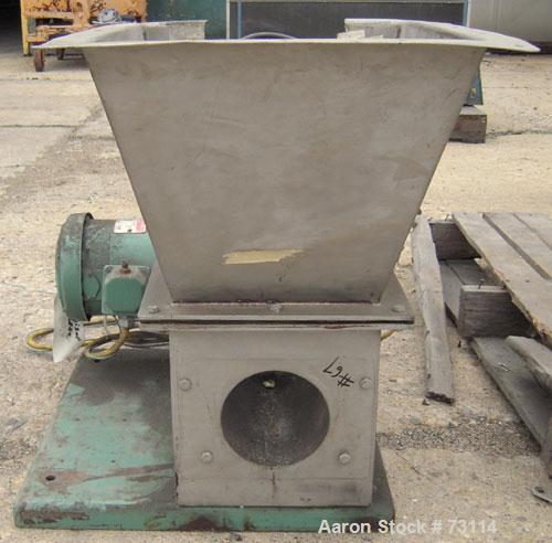 Used Acrison Volumetric Feeder, Model 105X-G, 304 Stainless Steel. Trough measures approximately 9" diameter x 10" long x 7" deep with a 20’’ extension. Driven by a 1/4 hp, 90 volt, 1725 rpm gear mot...