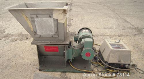 Used Acrison Volumetric Feeder, Model 105X-G, 304 Stainless Steel. Trough measures approximately 9" diameter x 10" long x 7" deep with a 20’’ extension. Driven by a 1/4 hp, 90 volt, 1725 rpm gear mot...