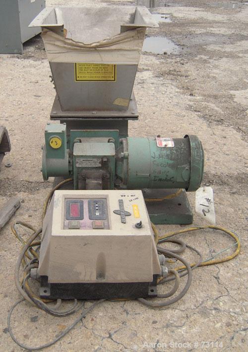 Used Acrison Volumetric Feeder, Model 105X-G, 304 Stainless Steel. Trough measures approximately 9" diameter x 10" long x 7" deep with a 20’’ extension. Driven by a 1/4 hp, 90 volt, 1725 rpm gear mot...