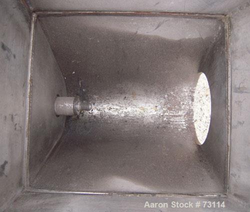 Used Acrison Volumetric Feeder, Model 105X-G, 304 Stainless Steel. Trough measures approximately 9" diameter x 10" long x 7" deep with a 20’’ extension. Driven by a 1/4 hp, 90 volt, 1725 rpm gear mot...