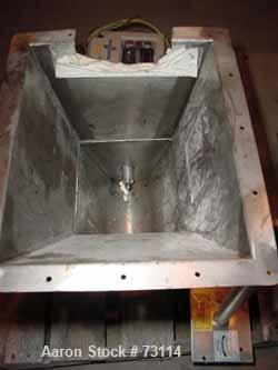 Used Acrison Volumetric Feeder, Model 105X-G, 304 Stainless Steel. Trough measures approximately 9" diameter x 10" long x 7" deep with a 20’’ extension. Driven by a 1/4 hp, 90 volt, 1725 rpm gear mot...
