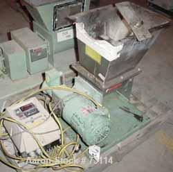 Used Acrison Volumetric Feeder, Model 105X-G, 304 Stainless Steel. Trough measures approximately 9" diameter x 10" long x 7" deep with a 20’’ extension. Driven by a 1/4 hp, 90 volt, 1725 rpm gear mot...