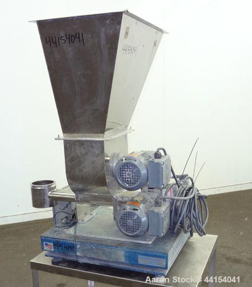 Used Brabender Technologie Twin Screw Feeder, Model DDSR40/60, 304 Stainless Steel. (2) Approximate 2" diameter x 15" long screws, driven by a 1/2hp, 3/60/230/460 volt, 1700 rpm gear motor. Feed hopp...
