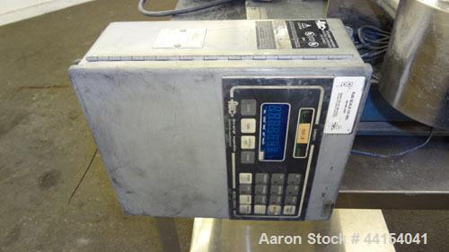 Used Brabender Technologie Twin Screw Feeder, Model DDSR40/60, 304 Stainless Steel. (2) Approximate 2" diameter x 15" long screws, driven by a 1/2hp, 3/60/230/460 volt, 1700 rpm gear motor. Feed hopp...
