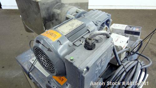 Used Brabender Technologie Twin Screw Feeder, Model DDSR40/60, 304 Stainless Steel. (2) Approximate 2" diameter x 15" long screws, driven by a 1/2hp, 3/60/230/460 volt, 1700 rpm gear motor. Feed hopp...