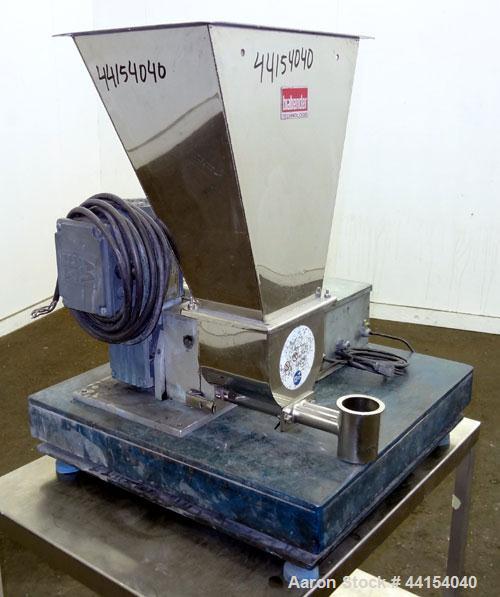 Used Brabender Technologie Twin Screw Feeder, 304 Stainless Steel. (2) Approximate 3/4” diameter x 9” long screws. Feed hopper with extension, and conditioning bar. Driven by a 1/2hp, 3/60/230/460 vo...