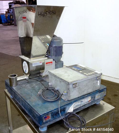 Used Brabender Technologie Twin Screw Feeder, 304 Stainless Steel. (2) Approximate 3/4” diameter x 9” long screws. Feed hopper with extension, and conditioning bar. Driven by a 1/2hp, 3/60/230/460 vo...