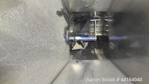 Used Brabender Technologie Twin Screw Feeder, 304 Stainless Steel. (2) Approximate 3/4” diameter x 9” long screws. Feed hopper with extension, and conditioning bar. Driven by a 1/2hp, 3/60/230/460 vo...