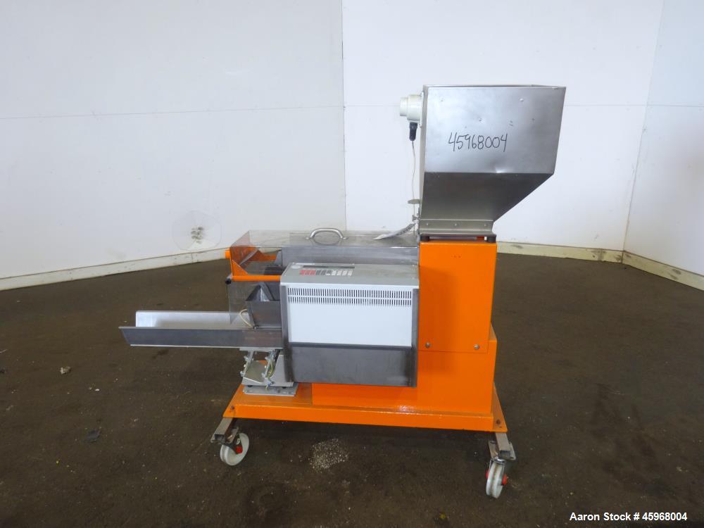 Used Engelhardt Continuous Dosing Weigher, Type KDE-GL 800E. Consists of top feed hopper, vibratory feeder with cover, weighing system, bottom discharge vibratory feeder. Has Engelhardt model DPC3000...