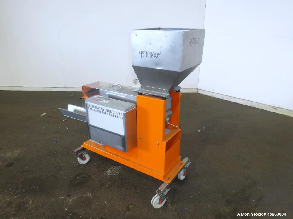 Used Engelhardt Continuous Dosing Weigher, Type KDE-GL 800E. Consists of top feed hopper, vibratory feeder with cover, weighing system, bottom discharge vibratory feeder. Has Engelhardt model DPC3000...