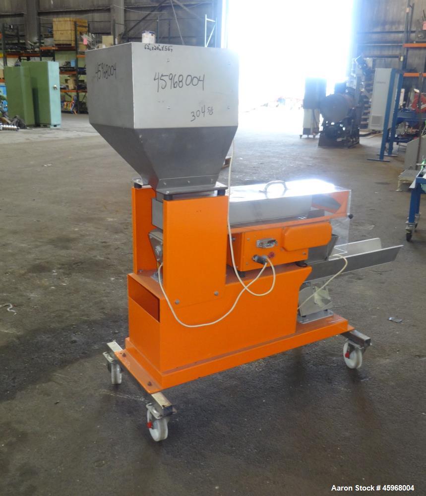 Used Engelhardt Continuous Dosing Weigher, Type KDE-GL 800E. Consists of top feed hopper, vibratory feeder with cover, weighing system, bottom discharge vibratory feeder. Has Engelhardt model DPC3000...