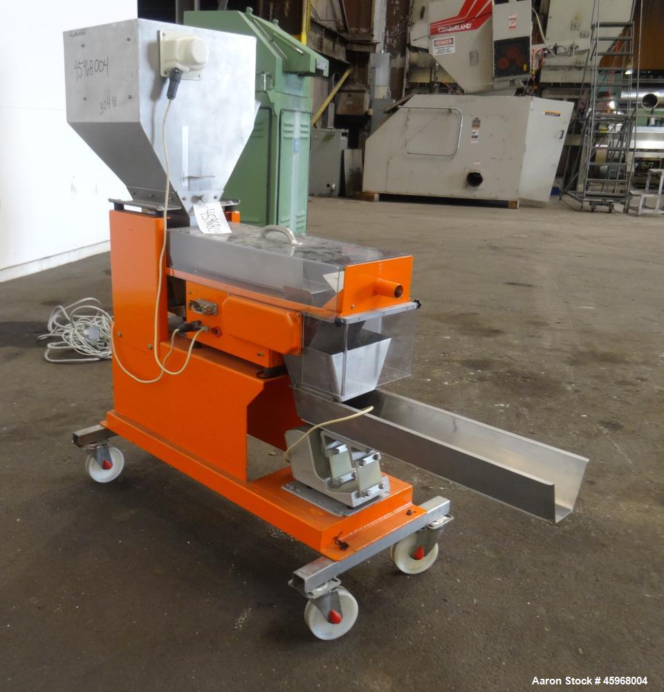 Used Engelhardt Continuous Dosing Weigher, Type KDE-GL 800E. Consists of top feed hopper, vibratory feeder with cover, weighing system, bottom discharge vibratory feeder. Has Engelhardt model DPC3000...