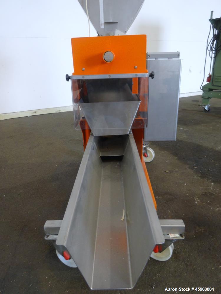 Used Engelhardt Continuous Dosing Weigher, Type KDE-GL 800E. Consists of top feed hopper, vibratory feeder with cover, weighing system, bottom discharge vibratory feeder. Has Engelhardt model DPC3000...