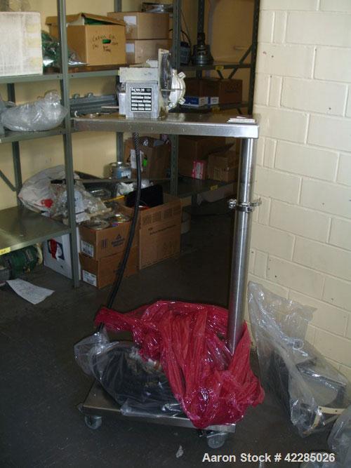 Used K-Tron Volumetric Feeder, Model F-1. Stainless steel, dual screw, rated 23 cubic feet an hour. Mounted on a stand with 0.25 hp motor. Serial #930249. Price includes 15% buyer's premium.