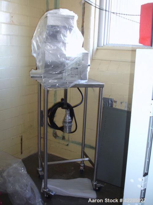 Used K-Tron Volumetric Feeder, Model F-1. Stainless steel, dual screw, rated 29 cubic feet an hour. Mounted on a stand with 0.50 hp motor. Serial #T3-82-086. Price includes 15% buyer's premium.