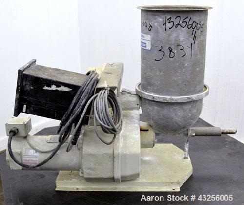 Used K-Tron Volumetric Twin Screw Feeder, Model K2-MV- T20, 316 Stainless Steel. Approximate (0.025) to 2.5 cubic feet an hour output. (2) Approximate 5/8” diameter intermeshing screws. Driven by a 0...