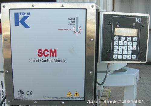 Used K-Tron Vibratory Feeder, Model K2MLKV2, 304 Stainless Steel.  Rated approximately 100 pounds per hour.  Includes a top mounted 316 stainless steel hopper and a Smart Control Module with keypad.