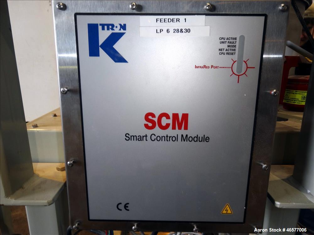 Used Feeder System Consisting of  (1) K-Tron feeder model K2MLS rated for 300 pounds per hour driven by a 0.45 kw, 200 volt, 2000 rpm motor (1) K-Tron feeder model K2MLT20 rated for 20 pounds per hou...