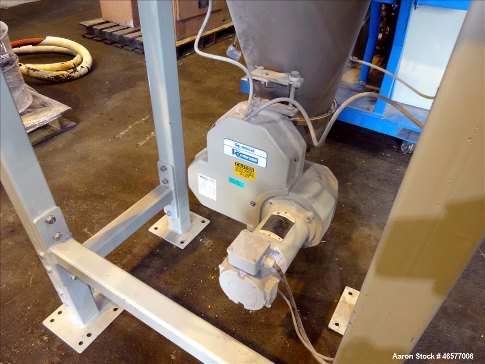 Used Feeder System Consisting of  (1) K-Tron feeder model K2MLS rated for 300 pounds per hour driven by a 0.45 kw, 200 volt, 2000 rpm motor (1) K-Tron feeder model K2MLT20 rated for 20 pounds per hou...