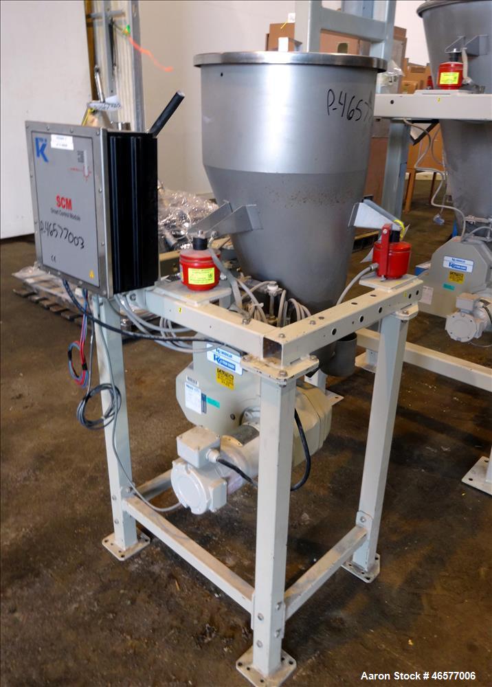 Used Feeder System Consisting of  (1) K-Tron feeder model K2MLS rated for 300 pounds per hour driven by a 0.45 kw, 200 volt, 2000 rpm motor (1) K-Tron feeder model K2MLT20 rated for 20 pounds per hou...