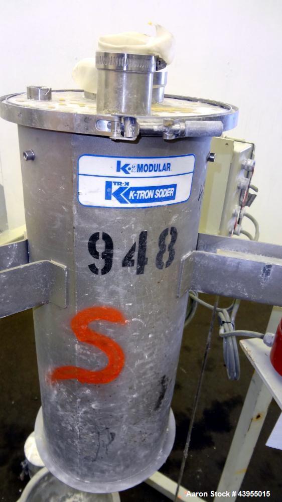 Used K-Tron Volumetric Feeder Model K2MLT20, Stainless Steel, Approximate (2) 2" diameter x 16" long twin screw design, driven by a .45kw, 200 volt, 2000 rpm motor. Approximately 5-100 pounds per hou...