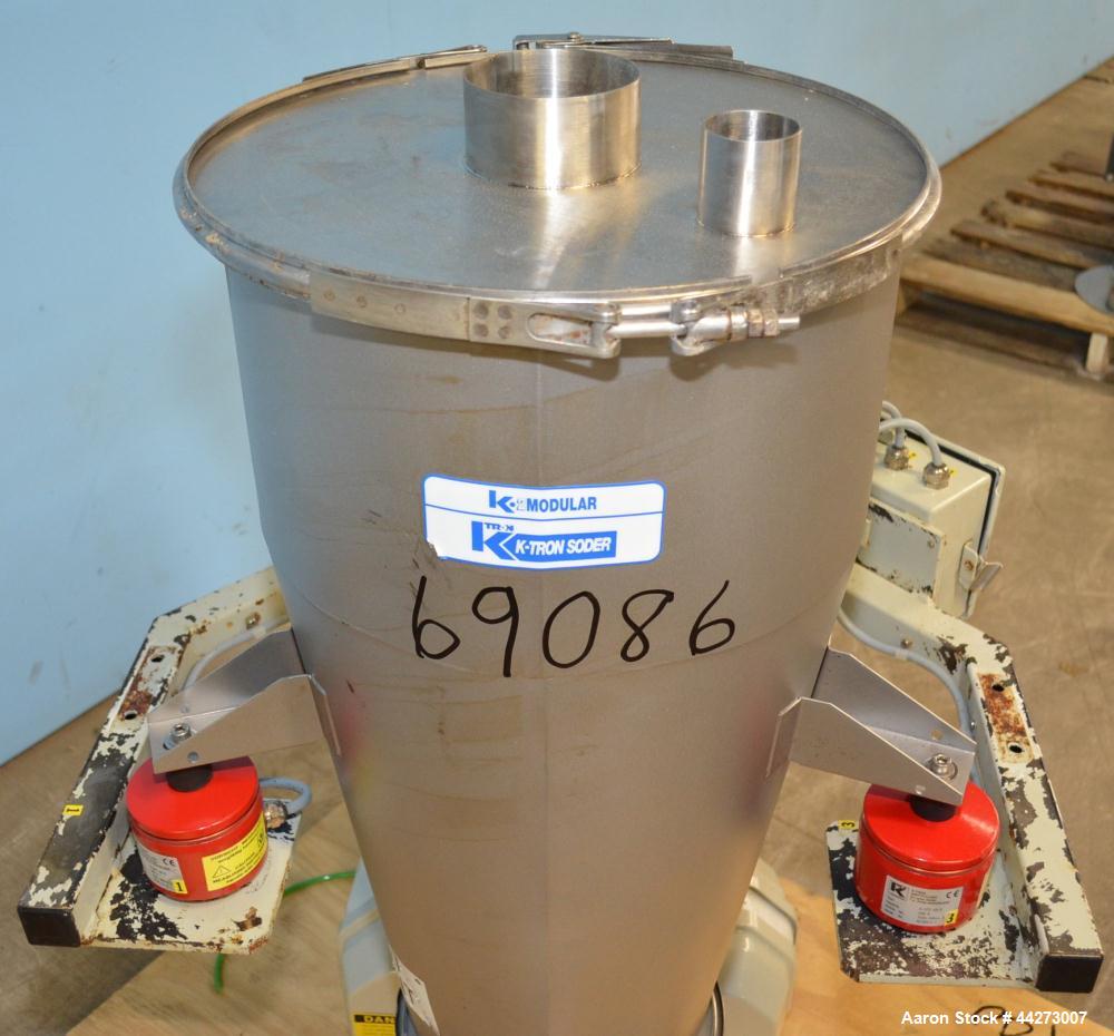 Used K-Tron Screw Type Modular Loss In Weight Feeder, Model K2MLT20, Stainless Steel. Approximate 3/4" diameter x 25" long twin screw design, driven by a 0.45kw, 100 volt DC motor. Approximate 125 po...
