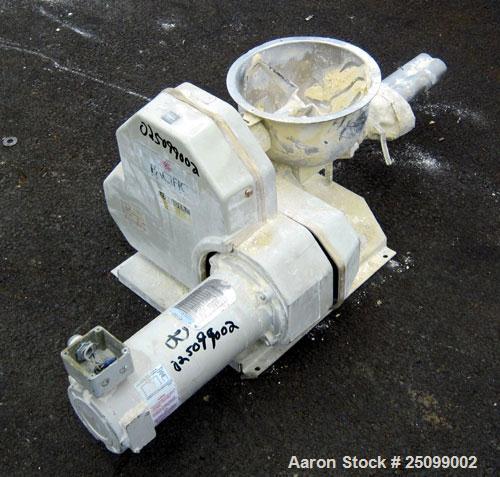 Used K-Tron Volumetric Twin Screw Feeder, Model K2V-T35. Approximate 162.8 pounds per hour output. (2) Approximate 1-3/8" diameter intermeshing 304 stainless steel screws, driven by a 1/2hp, 90 volt,...
